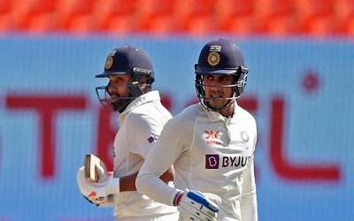 Indias Rohit Sharma (L) and Shubman Gill in action