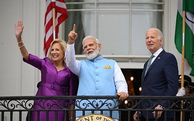 US First Lady Jill Biden, PM Modi and Joe Biden wave from a balcony at the White House